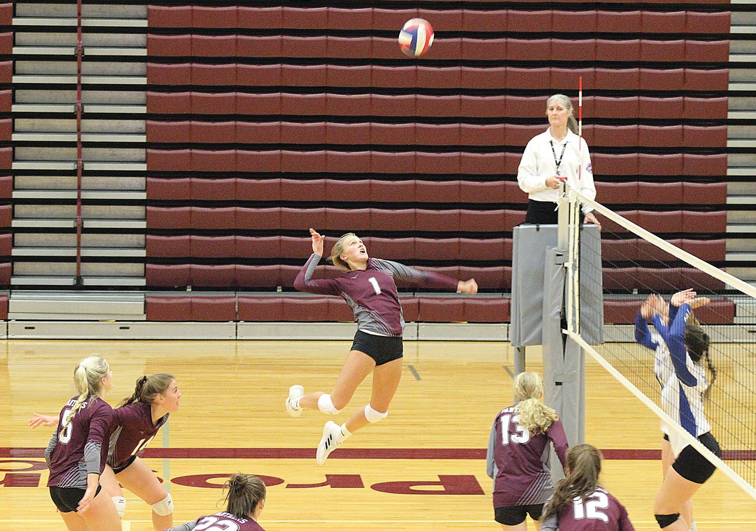 The Lady Panthers’ Raylee Stenzel goes up for a kill.